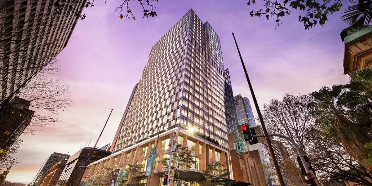 a very tall building sitting in the middle of a city